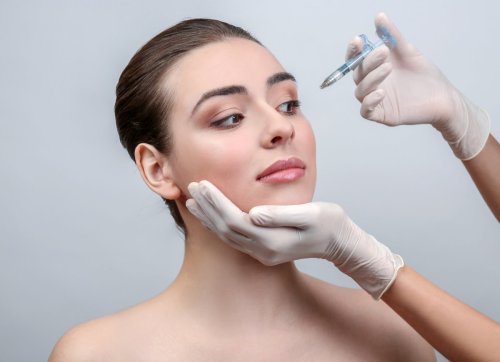 female patient receives a Botox injection.
