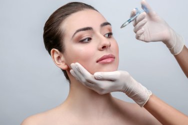 female patient receives a Botox injection.